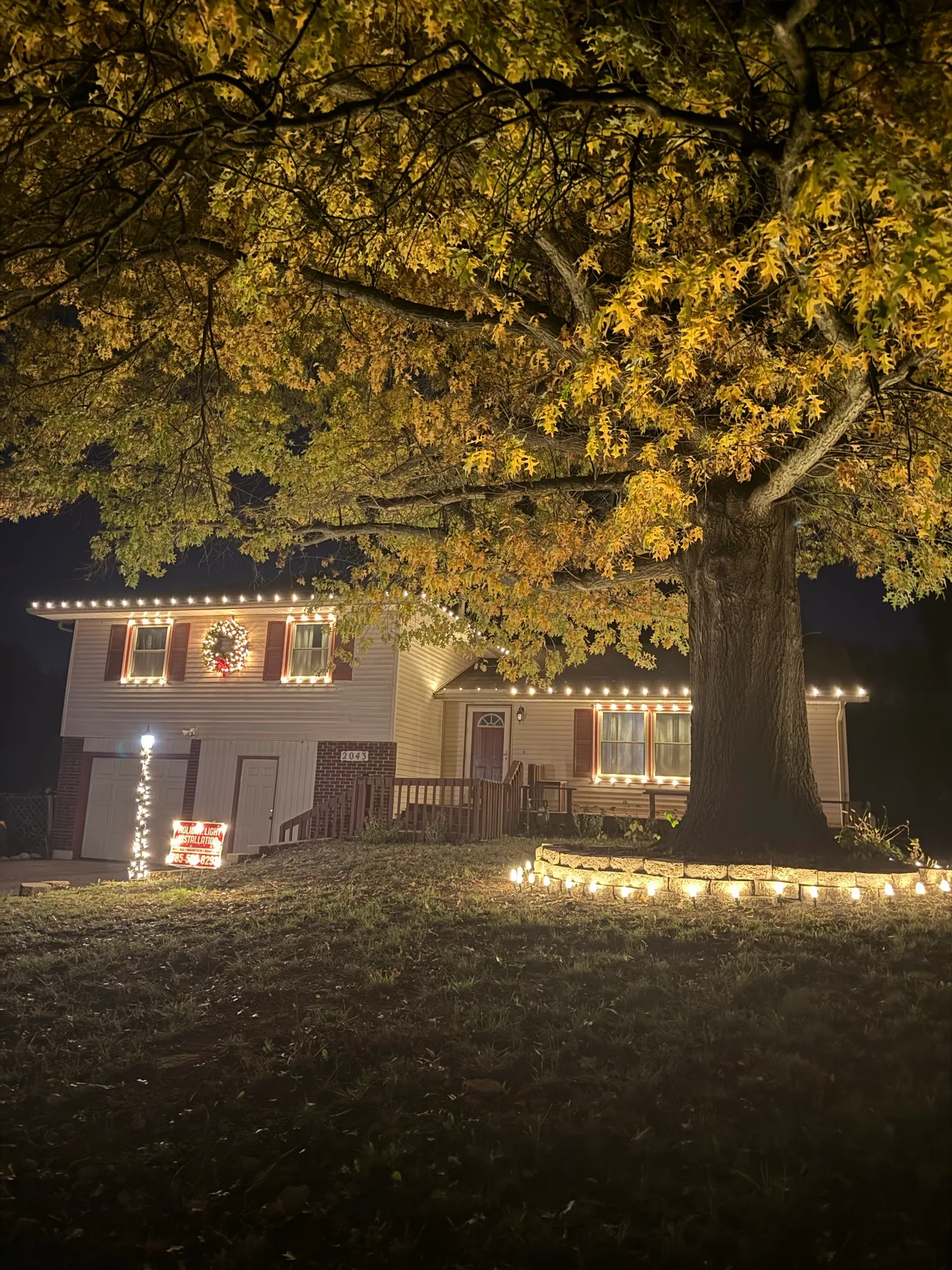 Residential roofline holiday lighting installed by RM Lighting Solutions